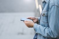 person holding mobile phone
